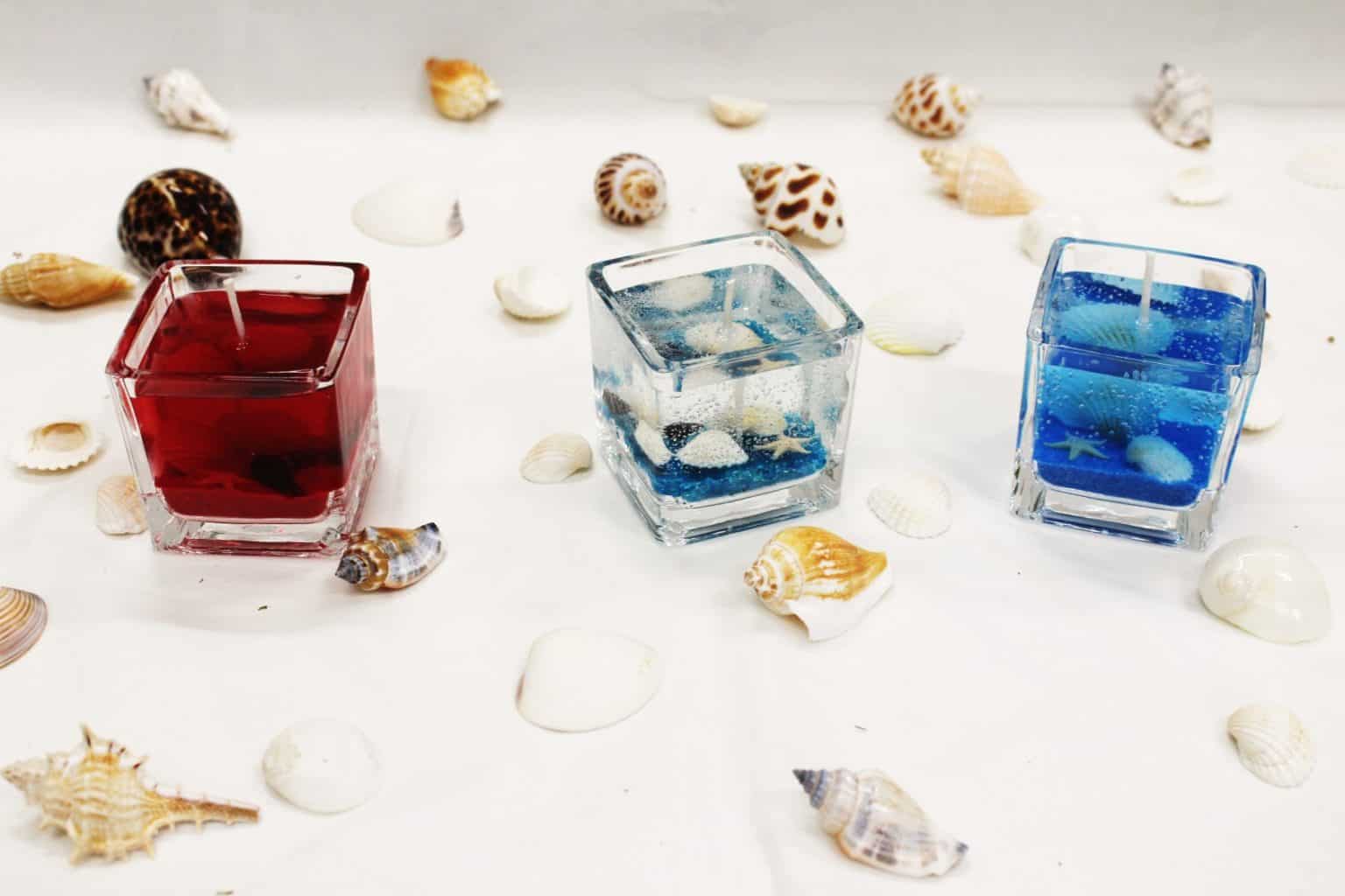 Colorful gel candles decorated with shells